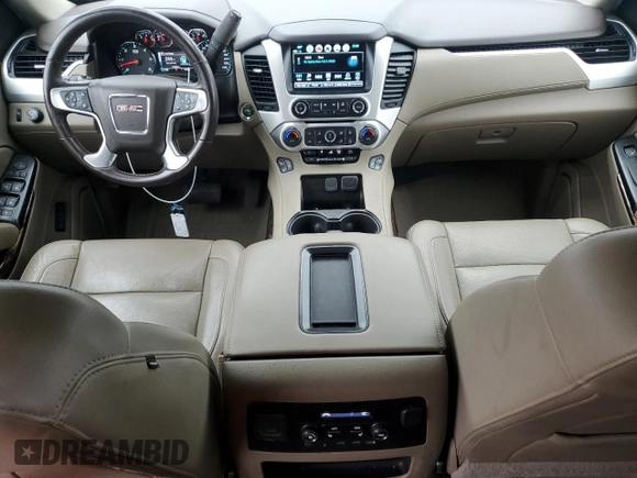 2020 GMC Yukon SLT with VIN 1GKS1BKC3LR168874, listed as a Copart auction lot 82103464 with 79,220 mi miles and Salvage Title. Bid and sale history available at DreamBid. Image 8.