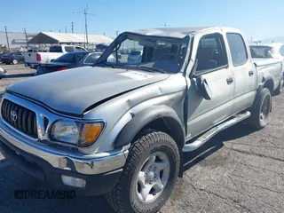 2001 Toyota Tacoma PreRunner z VIN 5TEGN92N51Z804874, wystawiony jako IAAI lot #41861876 z przebiegiem 201 333 mil mil oraz . Historia ofert i sprzedaży dostępna na DreamBid. Obrazek 6.
