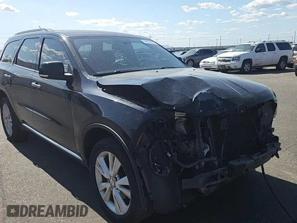 2013 Dodge Durango Crew z VIN 1C4RDJDGXDC672239, wystawiony jako Copart lot #59227905 z przebiegiem 167 982 mil mil oraz Szkoda całkowita • Salvage title. Historia ofert i sprzedaży dostępna na DreamBid. Obrazek 15.