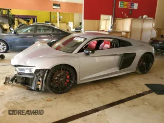 2018 Audi R8 V10 z VIN WUABAAFX7J7902267, wystawiony jako Copart lot #44403794 z przebiegiem Nie podano mil oraz Szkoda całkowita • Salvage title. Historia ofert i sprzedaży dostępna na DreamBid. Obrazek 1.