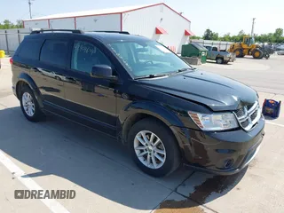 2017 Dodge Journey SXT z VIN 3C4PDCBG1HT523010, wystawiony jako IAAI lot #42404624 z przebiegiem 198 519 mil mil oraz . Historia ofert i sprzedaży dostępna na DreamBid. Obrazek 1.