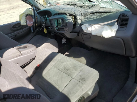 2002 Ford F-150 XL with VIN 1FTRF07L62KD27855, listed as a Copart auction lot 60939935 with Not provided miles and Salvage title. Bid and sale history available at DreamBid. Image 8.
