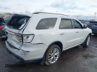 2014 Dodge Durango Citadel with VIN 1C4RDJEG0EC476018, listed as a IAAI auction lot 41212456 with 154,929 mi miles and . Bid and sale history available at DreamBid. Image 4.