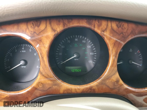 1998 Jaguar XJ Vanden Plas with VIN SAJKX6245WC830912, listed as a Copart auction lot 49717285 with 127,509 mi miles and Salvage Title. Bid and sale history available at DreamBid. Image 9.