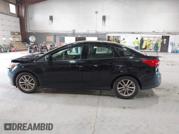 2018 Ford Focus SE with VIN 1FADP3FE8JL209560, listed as a IAAI auction lot 42707236 with 166,017 mi miles and . Bid and sale history available at DreamBid. Image 14.