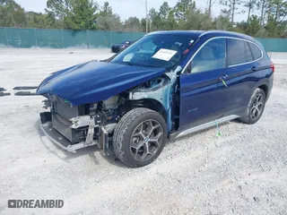 2018 BMW X1 sDrive28i with VIN WBXHU7C34J5H44572, listed as a IAAI auction lot 41607151 with 43,056 mi miles. Bid and sale history available at carsss.com. Image 6.