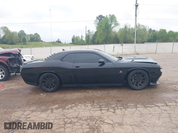 2016 Dodge Challenger R/T Scat Pack z VIN 2C3CDZFJ4GH118973, wystawiony jako IAAI lot #41960654 z przebiegiem 180 315 mil mil oraz . Historia ofert i sprzedaży dostępna na DreamBid. Obrazek 13.
