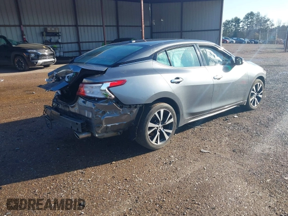 2016 Nissan Maxima SV z VIN 1N4AA6APXGC386974, wystawiony jako IAAI lot #41738932 z przebiegiem 132 395 mil mil oraz . Historia ofert i sprzedaży dostępna na DreamBid. Obrazek 4.