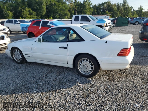 1997 Mercedes-Benz SL 500 with VIN WDBFA67FXVF149930, listed as a Copart auction lot 64749525 with 88,523 mi miles and Salvage title. Bid and sale history available at DreamBid. Image 2.