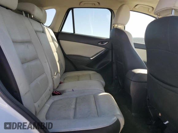 2016 Mazda CX-5 Grand Touring with VIN JM3KE2DY4G0704001, listed as a Copart auction lot 49666445 with 149,000 mi miles and Salvage Title. Bid and sale history available at carsss.com. Image 11.