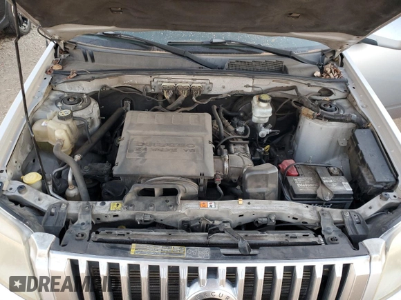 2010 Mercury Mariner Premier with VIN 4M2CN9HG6AKJ00320, listed as a Copart auction lot 77432934 with 201,699 mi miles and Salvage Title. Bid and sale history available at carsss.com. Image 12.