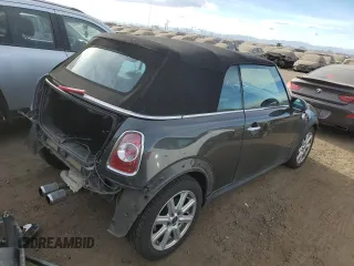 2011 MINI Convertible S z VIN WMWZP3C52BTX83901, wystawiony jako Copart lot #84217174 z przebiegiem 82 831 mil mil oraz Szkoda całkowita • Salvage title. Historia ofert i sprzedaży dostępna na DreamBid. Obrazek 3.
