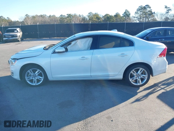 2015 Volvo S60 T5 Drive-E Premier Plus with VIN YV140MFC6F1314534, listed as a IAAI auction lot 41348374 with 81,235 mi miles. Bid and sale history available at carsss.com. Image 14.