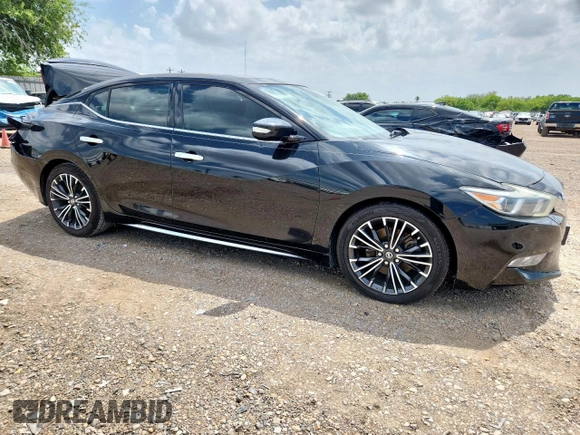 2016 Nissan Maxima SL with VIN 1N4AA6AP1GC409820, listed as a Copart auction lot 60888725 with 124,998 mi miles and Salvage title. Bid and sale history available at DreamBid. Image 4.