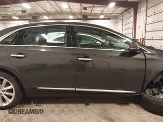 2013 Cadillac XTS Luxury with VIN 2G61R5S32D9101909, listed as a IAAI auction lot 41461611 with 110,603 mi miles. Bid and sale history available at carsss.com. Image 13.
