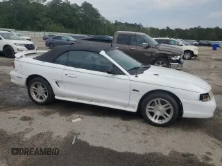 1998 Ford Mustang GT with VIN 1FAFP45X1WF263449, listed as a Copart auction lot 55851015 with 131,937 mi miles and Salvage title. Bid and sale history available at DreamBid. Image 4.