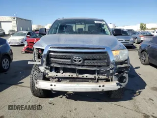 2012 Toyota Tundra 4WD Truck with VIN 5TFUM5F12CX031331, listed as a Copart auction lot 73571524 with 273,611 mi miles and Salvage Title. Bid and sale history available at carsss.com. Image 5.