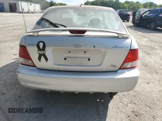 2002 Hyundai Accent GL with VIN KMHCG35C62U170660, listed as a Copart auction lot 49396344 with 145,942 mi miles and Salvage Title. Bid and sale history available at carsss.com. Image 6.