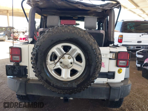 2007 Jeep Wrangler X with VIN 1J4FA24137L128418, listed as a IAAI auction lot 42317921 with 148,412 mi miles and . Bid and sale history available at DreamBid. Image 15.