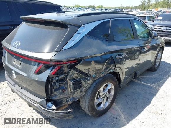 2022 Hyundai Tucson SEL with VIN 5NMJB3AEXNH144592, listed as a IAAI auction lot 42037487 with 75,651 mi miles and . Bid and sale history available at DreamBid. Image 4.