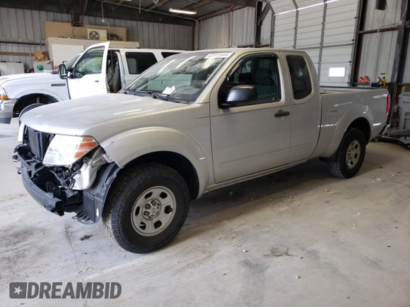 2015 Nissan Frontier SV with VIN 1N6BD0CT1FN713999, listed as a Copart auction lot 62053944 with 104,667 mi miles and Salvage title. Bid and sale history available at DreamBid. Image 1.