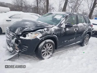 2016 Mazda CX-5 Sport z VIN JM3KE4BY0G0919017, wystawiony jako IAAI lot #41316161 z przebiegiem 209 259 mil mil oraz . Historia ofert i sprzedaży dostępna na DreamBid. Obrazek 17.