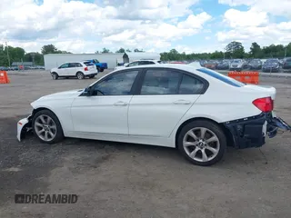 2013 BMW 3 Series 335i xDrive with VIN WBA3B9C59DJ899358, listed as a IAAI auction lot 42321863 with 127,700 mi miles and . Bid and sale history available at DreamBid. Image 14.
