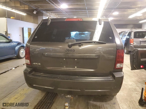 2006 Jeep Grand Cherokee Laredo with VIN 1J4GS48K26C285341, listed as a Copart auction lot 59287334 with 218,787 mi miles and Salvage Title. Bid and sale history available at carsss.com. Image 6.