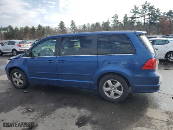2010 Volkswagen Routan SEL w/Navigation with VIN 2V4RW5DX7AR406977, listed as a Copart auction lot 79414844 with 152,181 mi miles and Salvage Title. Bid and sale history available at carsss.com. Image 2.