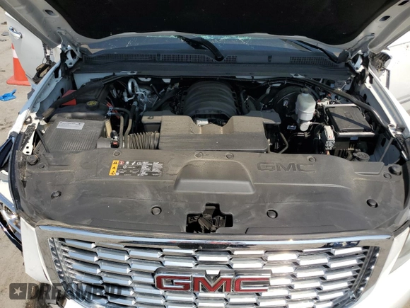2019 GMC Yukon Denali with VIN 1GKS1CKJ7KR194428, listed as a Copart auction lot 71191064 with 56,409 mi miles and Salvage Title. Bid and sale history available at carsss.com. Image 12.