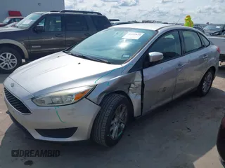 2015 Ford Focus SE z VIN 1FADP3F21FL348863, wystawiony jako IAAI lot #42401820 z przebiegiem 126 329 mil mil oraz . Historia ofert i sprzedaży dostępna na DreamBid. Obrazek 17.