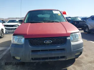2003 Ford Escape XLT Popular 2 with VIN 1FMYU93123KB02310, listed as a IAAI auction lot 41975073 with 169,864 mi miles. Bid and sale history available at carsss.com. Image 12.