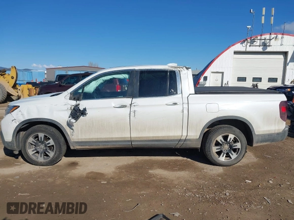 2020 Honda Ridgeline RTL with VIN 5FPYK3F50LB028430, listed as a IAAI auction lot 42033090 with Not provided miles and . Bid and sale history available at DreamBid. Image 14.