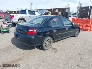 2004 Dodge Neon SE with VIN 1B3ES26C14D557254, listed as a IAAI auction lot 41906730 with 235,092 mi miles. Bid and sale history available at carsss.com. Image 4.