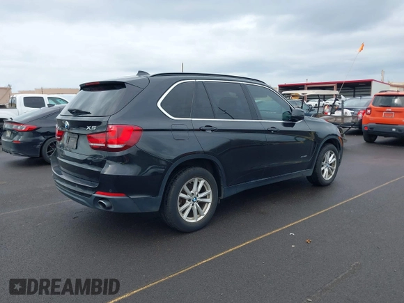 2014 BMW X5 xDrive35i z VIN 5UXKR0C51E0K50875, wystawiony jako IAAI lot #41807040 z przebiegiem 59 967 mil mil oraz . Historia ofert i sprzedaży dostępna na DreamBid. Obrazek 4.