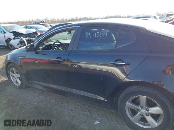 2015 Kia Optima LX with VIN 5XXGM4A75FG485653, listed as a IAAI auction lot 41082053 with 167,649 mi miles. Bid and sale history available at carsss.com. Image 13.