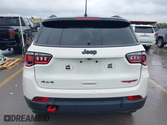 2020 Jeep Compass Trailhawk z VIN 3C4NJDDB6LT126585, wystawiony jako IAAI lot #42210794 z przebiegiem 132 220 mil mil oraz . Historia ofert i sprzedaży dostępna na DreamBid. Obrazek 16.