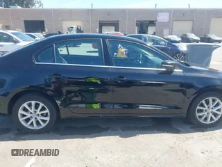 2013 Volkswagen Jetta SE with VIN 3VWDP7AJ7DM369161, listed as a IAAI auction lot 42277592 with 107,609 mi miles and . Bid and sale history available at DreamBid. Image 14.