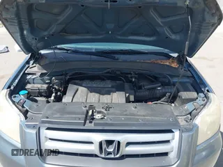 2007 Honda Pilot EX with VIN 2HKYF18447H520522, listed as a IAAI auction lot 42018937 with 128,401 mi miles. Bid and sale history available at carsss.com. Image 10.