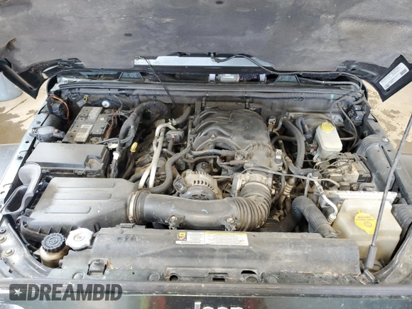 2012 Jeep Wrangler Unlimited Rubicon with VIN 1C4HJWFG4CL119390, listed as a Copart auction lot 60026425 with 305,189 mi miles and Salvage title. Bid and sale history available at DreamBid. Image 12.