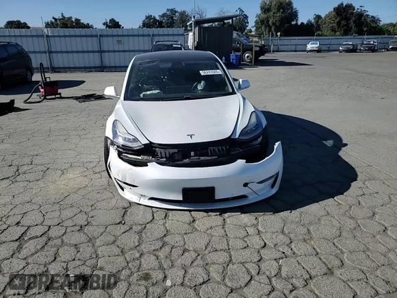 2019 Tesla Model 3 Mid Range z VIN 5YJ3E1EA7KF326727, wystawiony jako Copart lot #56243505 z przebiegiem 49 009 mil mil oraz Szkoda całkowita • Salvage title. Historia ofert i sprzedaży dostępna na DreamBid. Obrazek 14.