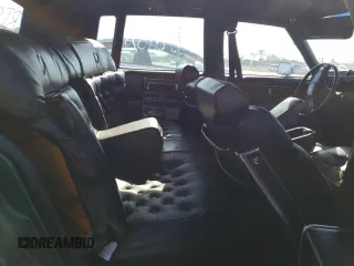 1992 Cadillac Brougham z VIN 1G6DW547XNR703499, wystawiony jako Copart lot #66709103 z przebiegiem Nie podano mil oraz Nie do naprawy. Historia ofert i sprzedaży dostępna na DreamBid. Obrazek 10.