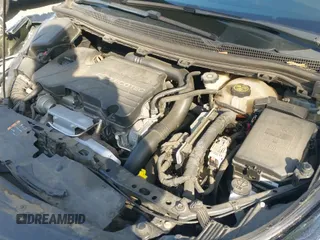 2017 Chevrolet Cruze LT z VIN 3G1BE6SM7HS518990, wystawiony jako IAAI lot #41899466 z przebiegiem 81 346 mil mil oraz . Historia ofert i sprzedaży dostępna na DreamBid. Obrazek 19.