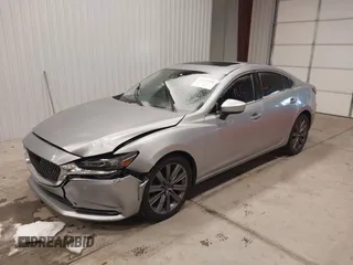 2018 Mazda 6 Touring with VIN JM1GL1VM8J1312778, listed as a IAAI auction lot 41387098 with 129,611 mi miles and . Bid and sale history available at carsss.com. Image 2.