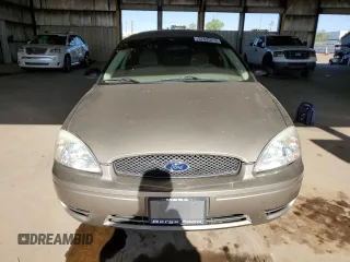 2007 Ford Taurus SE с VIN 1FAFP53UX7A119332, выставлен на аукционе Copart как лот 57625215 с пробегом 54 443 миль миль и Списание • Salvage title. История ставок и продаж доступна на DreamBid. Изображение 5.