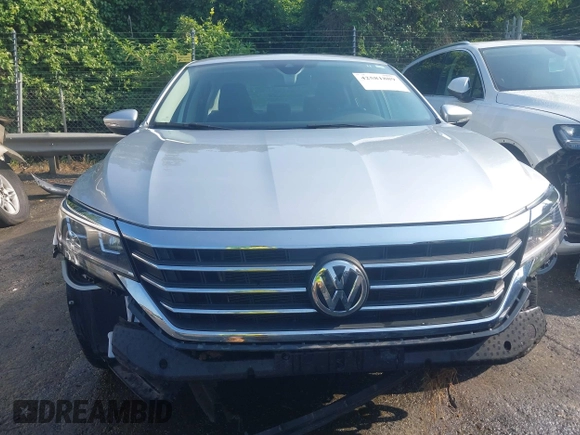 2021 Volkswagen Passat SE with VIN 1VWSA7A38MC012907, listed as a IAAI auction lot 42581889 with 76,001 mi miles and . Bid and sale history available at DreamBid. Image 6.