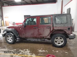 2009 Jeep Wrangler Unlimited X with VIN 1J4GZ39159L718649, listed as a IAAI auction lot 41395033 with 289,574 mi miles. Bid and sale history available at carsss.com. Image 14.