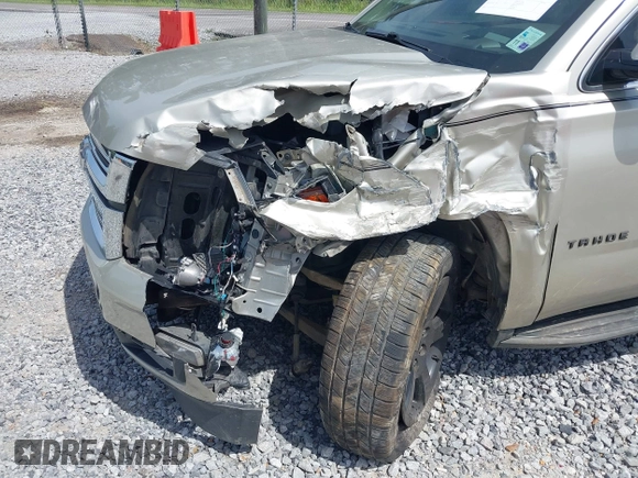 2015 Chevrolet Tahoe LT z VIN 1GNSCBKC7FR140125, wystawiony jako IAAI lot #42279760 z przebiegiem 201 335 mil mil oraz . Historia ofert i sprzedaży dostępna na DreamBid. Obrazek 6.