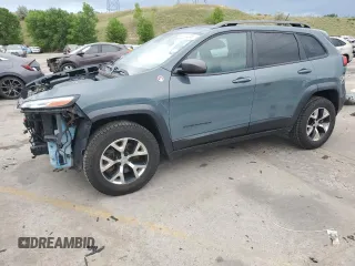 2015 Jeep Cherokee Trailhawk with VIN 1C4PJMBSXFW555223, listed as a Copart auction lot 62072235 with 207,240 mi miles and Non repairable. Bid and sale history available at DreamBid. Image 1.