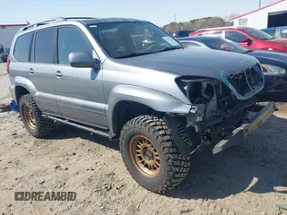 2004 Lexus GX 470 z VIN JTJBT20X240063306, wystawiony jako IAAI lot #41882033 z przebiegiem 151 715 mil mil oraz . Historia ofert i sprzedaży dostępna na DreamBid. Obrazek 1.